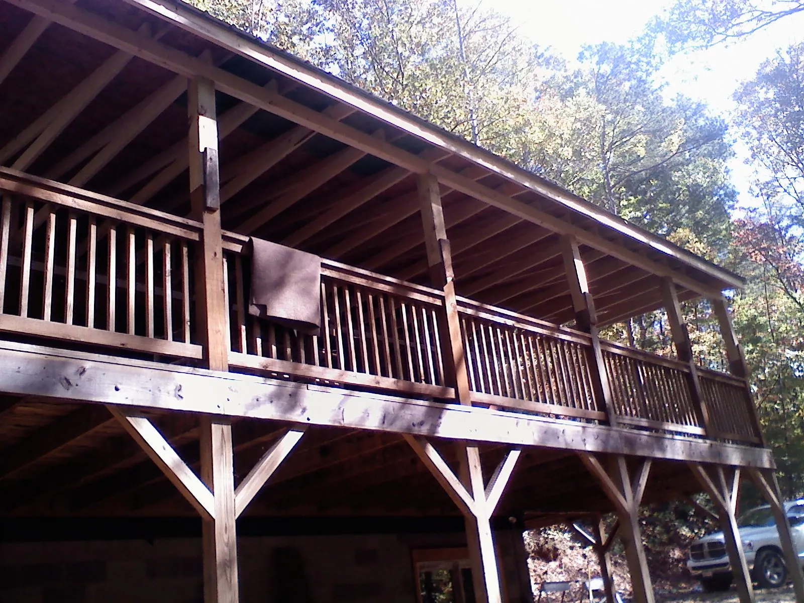 Timber framing under a new elevated porch and deck — Roof Leak Repair in Molena by Roofing Brothers